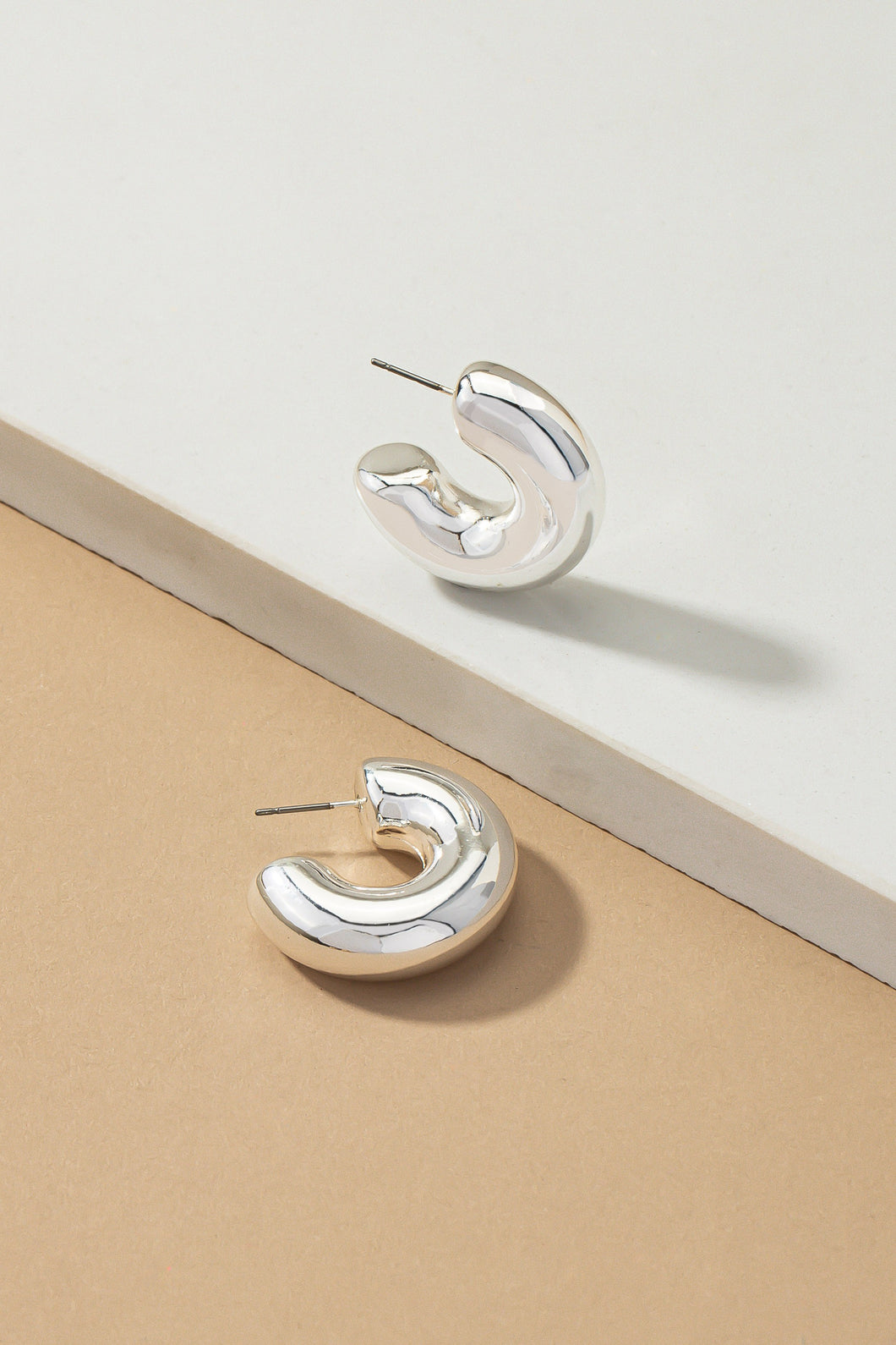 CANELA puffy C earrings